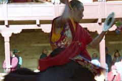 26 Tengboche Gompa 1997 Mani Rimdu Rehearsal Monk Twirls While Hitting Cymbals.jpg